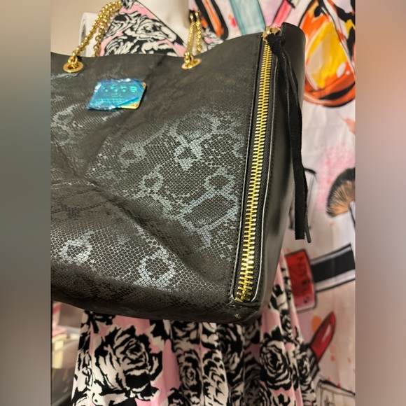 Like new Bebe black snack print tote/ shoulder bag with gold chain straps - Picture 14 of 14